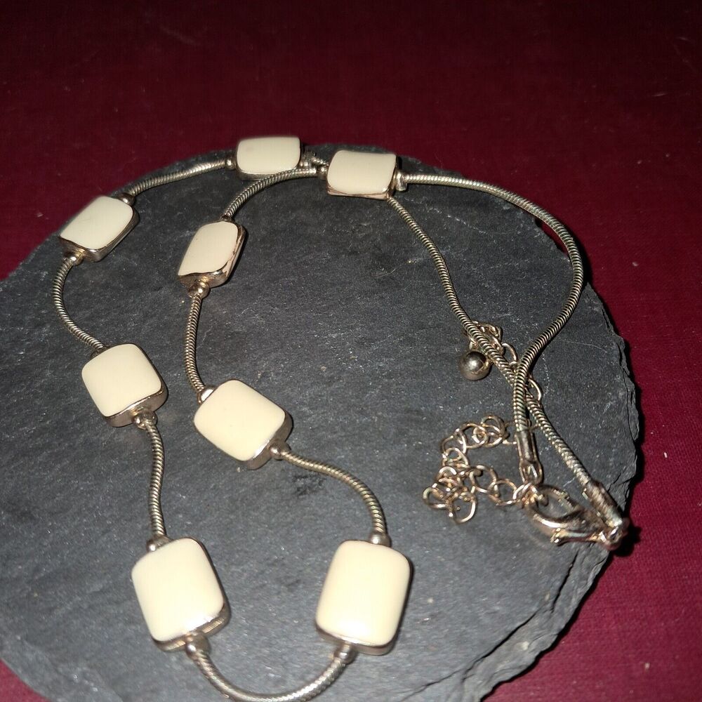 Off White Enamel And Goldtone Necklace